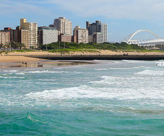 A view of  Durban's Golden Mile coastline, which can be visited with a cheap Durban holiday package from Flight Centre.